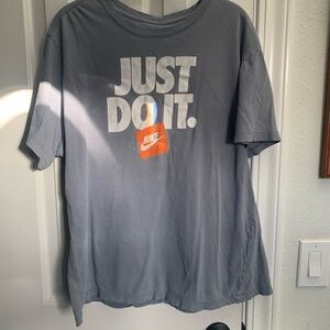 Nike Blue T-Shirt with Orange Logo